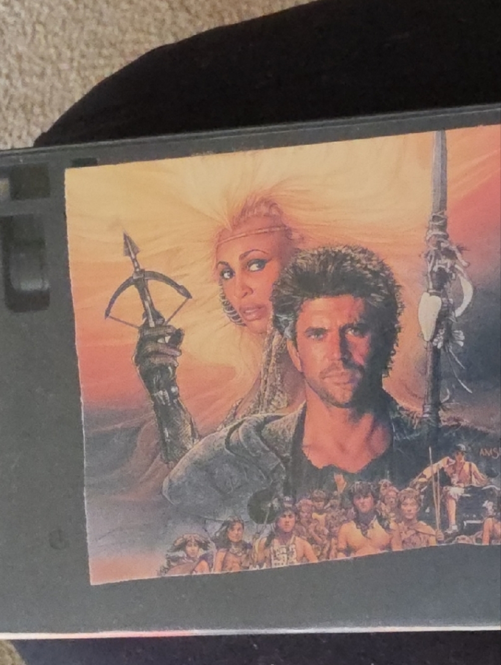 Vintage Movie Artwork VHS Case with Orange and Black Illustration